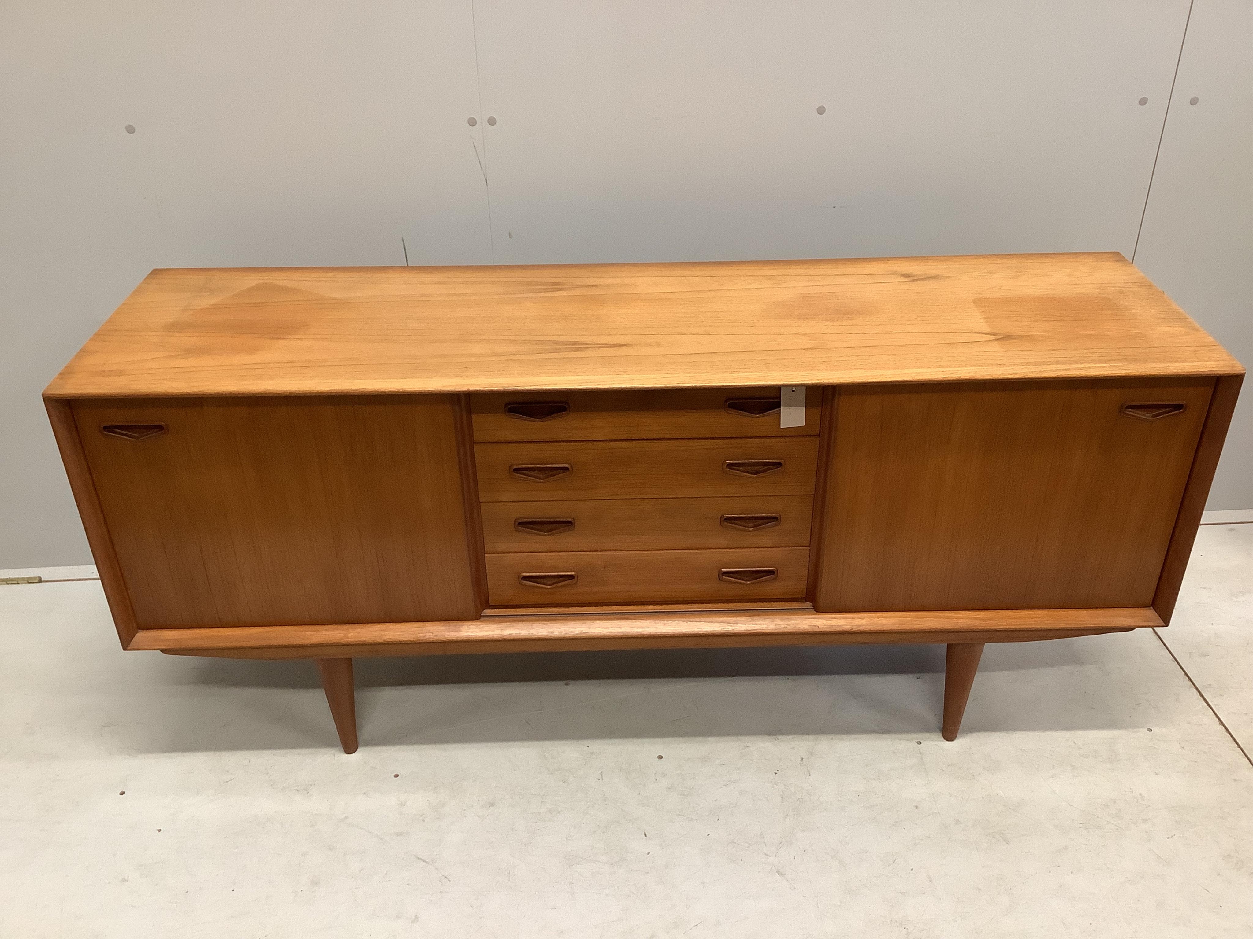 Clausen & Son, a mid century Danish teak sideboard, width 160cm, depth 45cm, height 70cm. Condition - fair